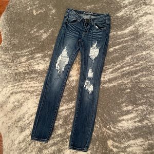 Machine Distressed Skinny Jeans